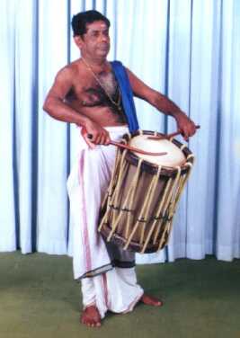 Sadanam Divakaran performing on Chenda